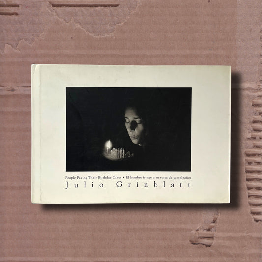 People Facing Their Birthday Cakes by Julio Grinblatt